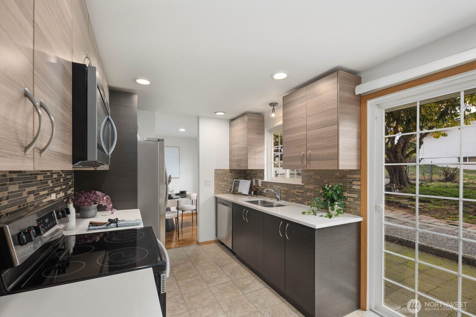 803 Southwest Dash Point Road Federal Way, WA 98023 - Photo 15 of 35 a kitchen with a stove and a refrigerator