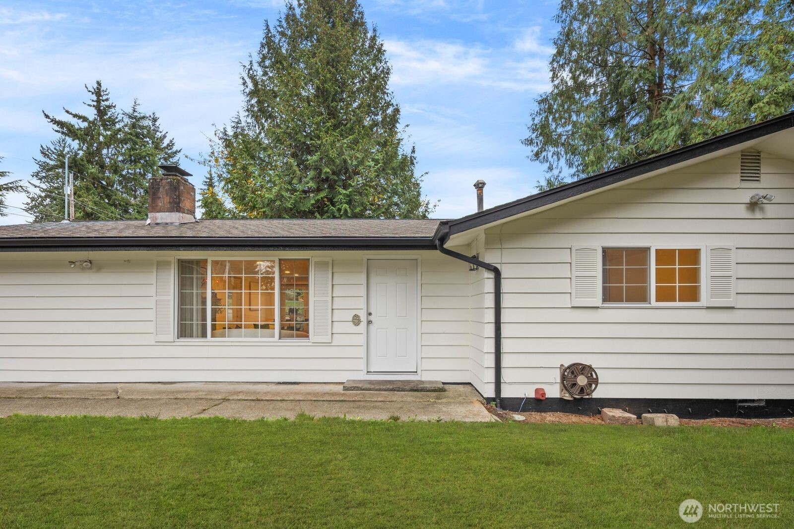 803 Southwest Dash Point Road Federal Way, WA 98023 - Photo 3 of 35 a front view of a house with a yard