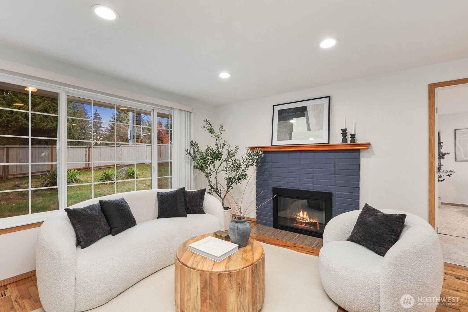803 Southwest Dash Point Road Federal Way, WA 98023 - Photo 7 of 35 a living room with furniture and a fireplace