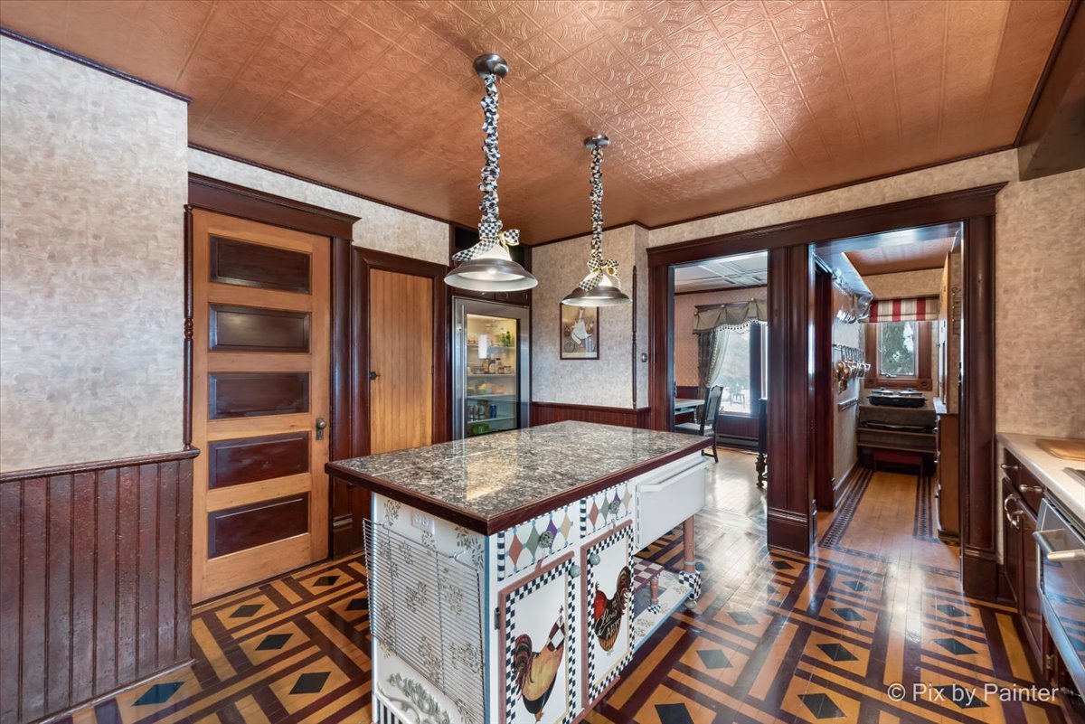 11004 Vanderkarr Road Hebron, IL 60034 - Photo 11 of 35 a open kitchen with a table and chairs in it