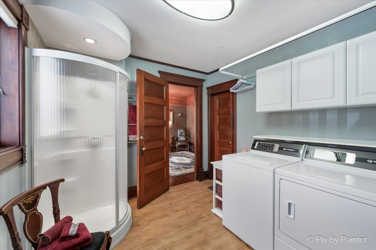 11004 Vanderkarr Road Hebron, IL 60034 - Photo 18 of 35 a storage room with washer and dryer