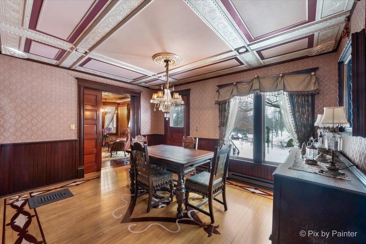 11004 Vanderkarr Road Hebron, IL 60034 - Photo 5 of 35 a view of a dining room with furniture window and wooden floor