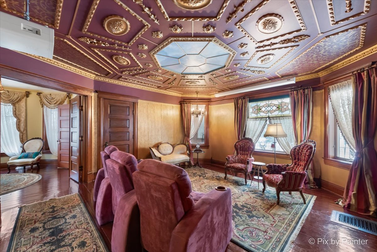 11004 Vanderkarr Road Hebron, IL 60034 - Photo 7 of 35 a living room with furniture and a large window