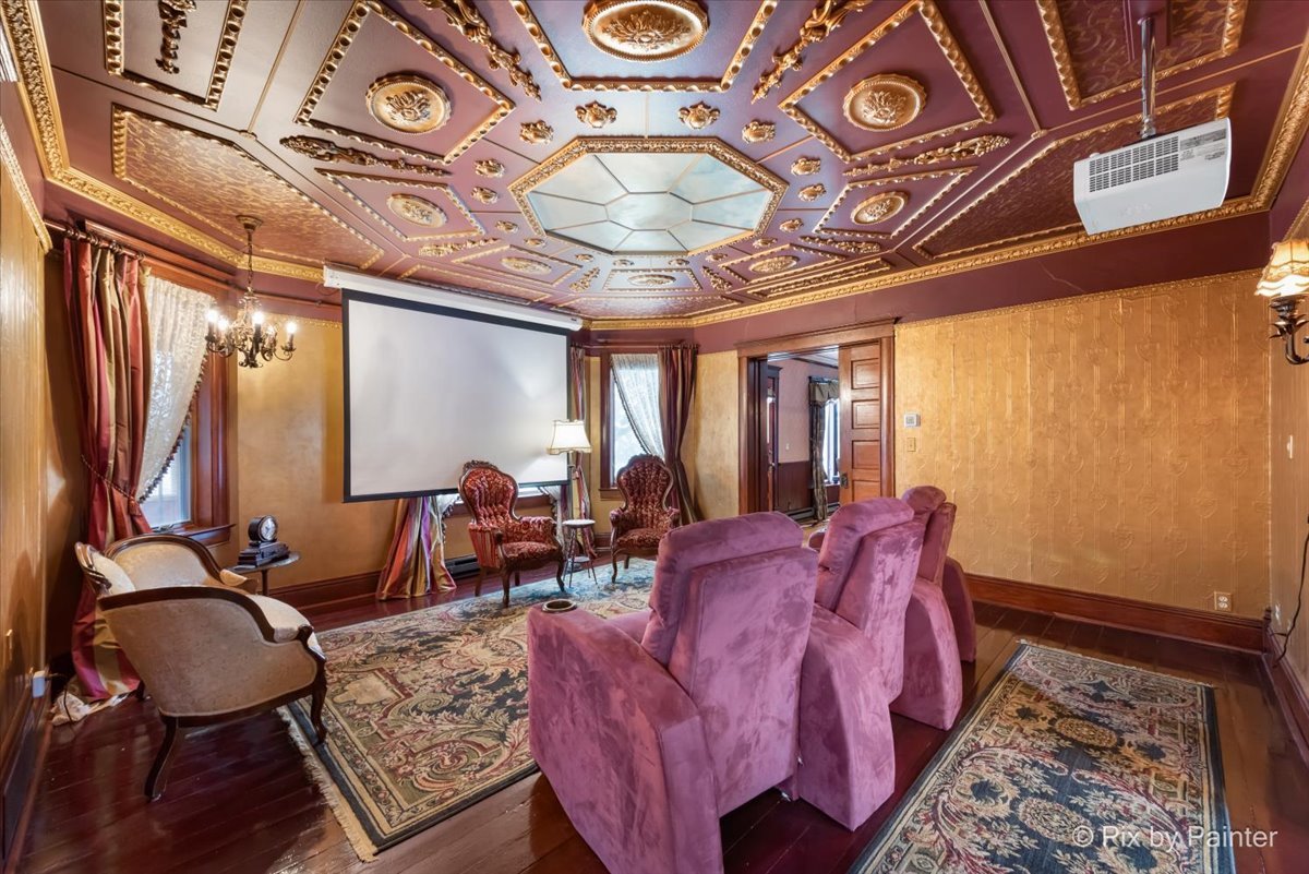 11004 Vanderkarr Road Hebron, IL 60034 - Photo 8 of 35 a living room with furniture and a chandelier