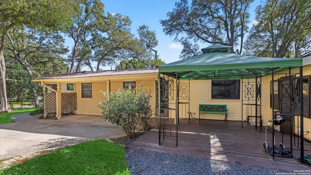 a view of a swimming pool with a patio