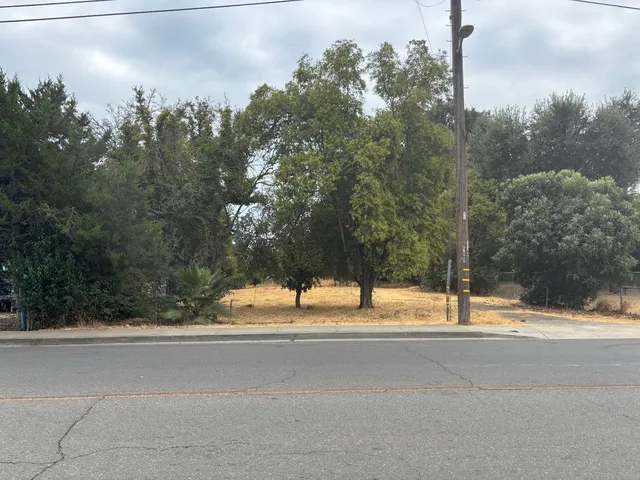 a view of road with a building in the background