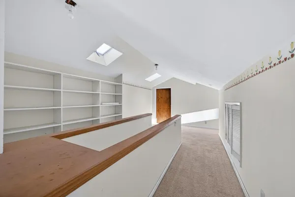 a view of a livingroom with a staircase