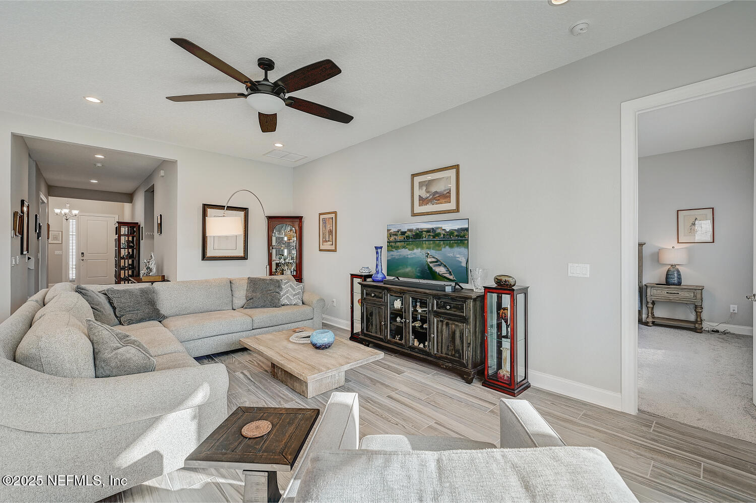 264 Vly Fls Way St. Johns, FL 32259 - Photo 14 of 37 a living room with furniture and a wooden floor