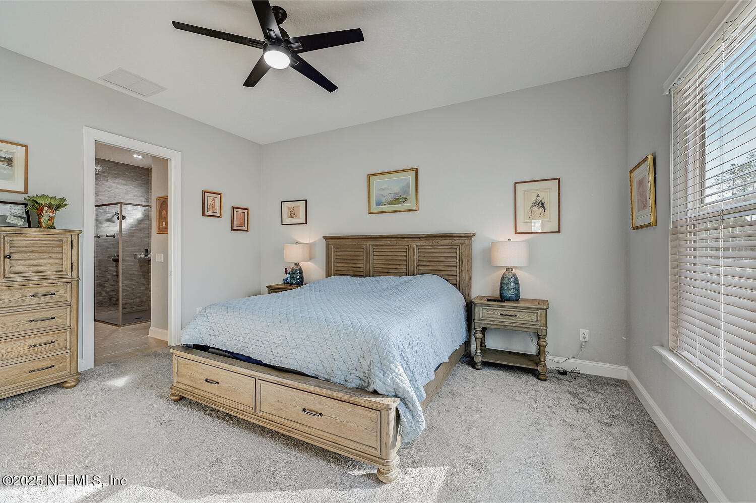 264 Vly Fls Way St. Johns, FL 32259 - Photo 21 of 37 a bedroom with a bed and ceiling fan