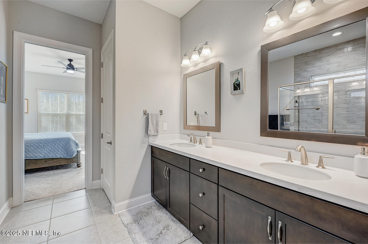 264 Vly Fls Way St. Johns, FL 32259 - Photo 24 of 37 a en suite bathroom with double sink and a mirror