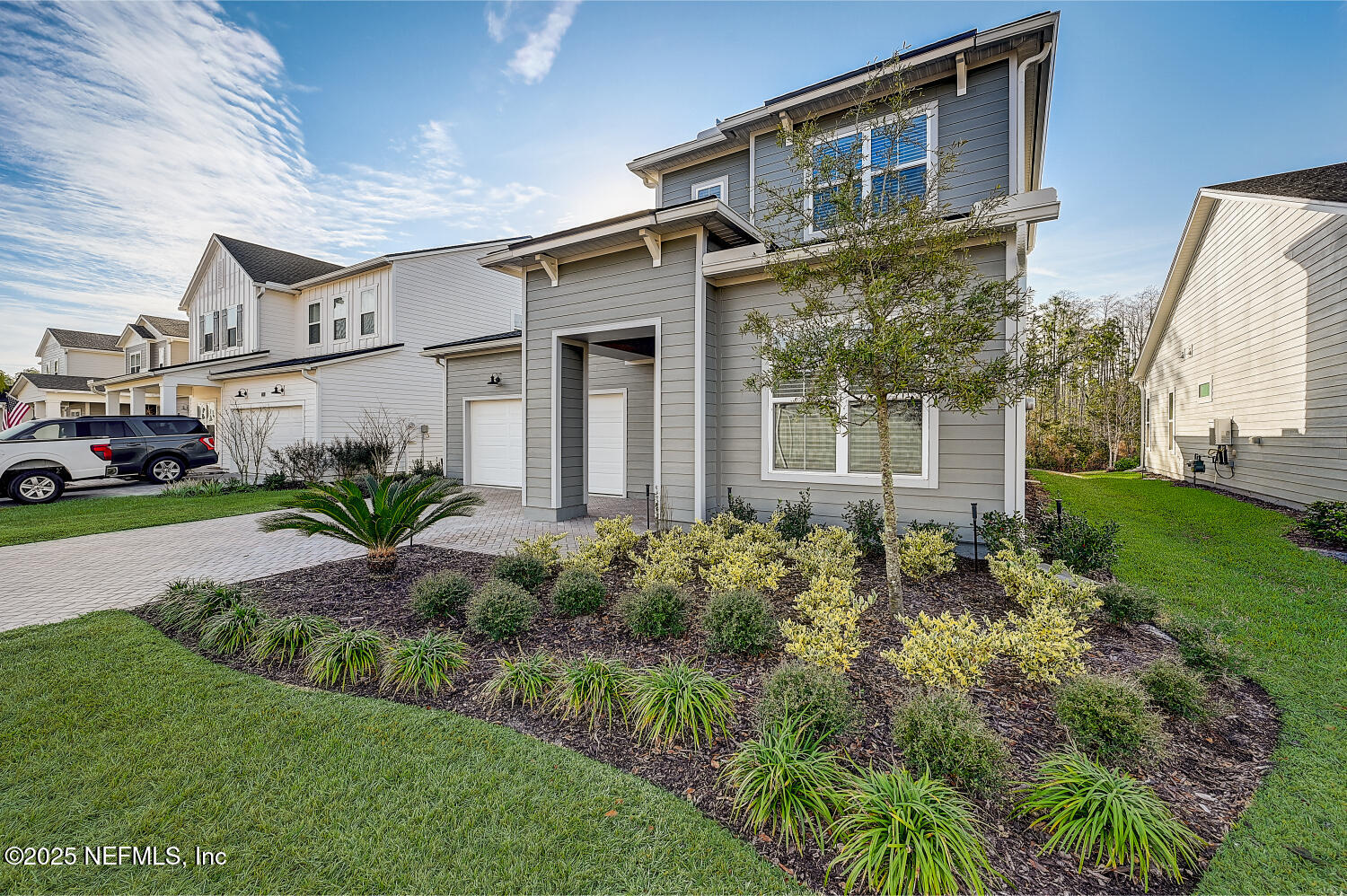 264 Vly Fls Way St. Johns, FL 32259 - Photo 5 of 37 a view of a white house next to a yard