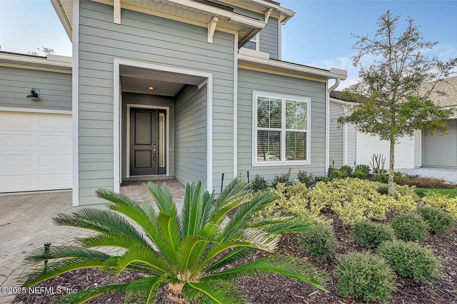 264 Vly Fls Way St. Johns, FL 32259 - Photo 8 of 37 a front view of a house with a garden