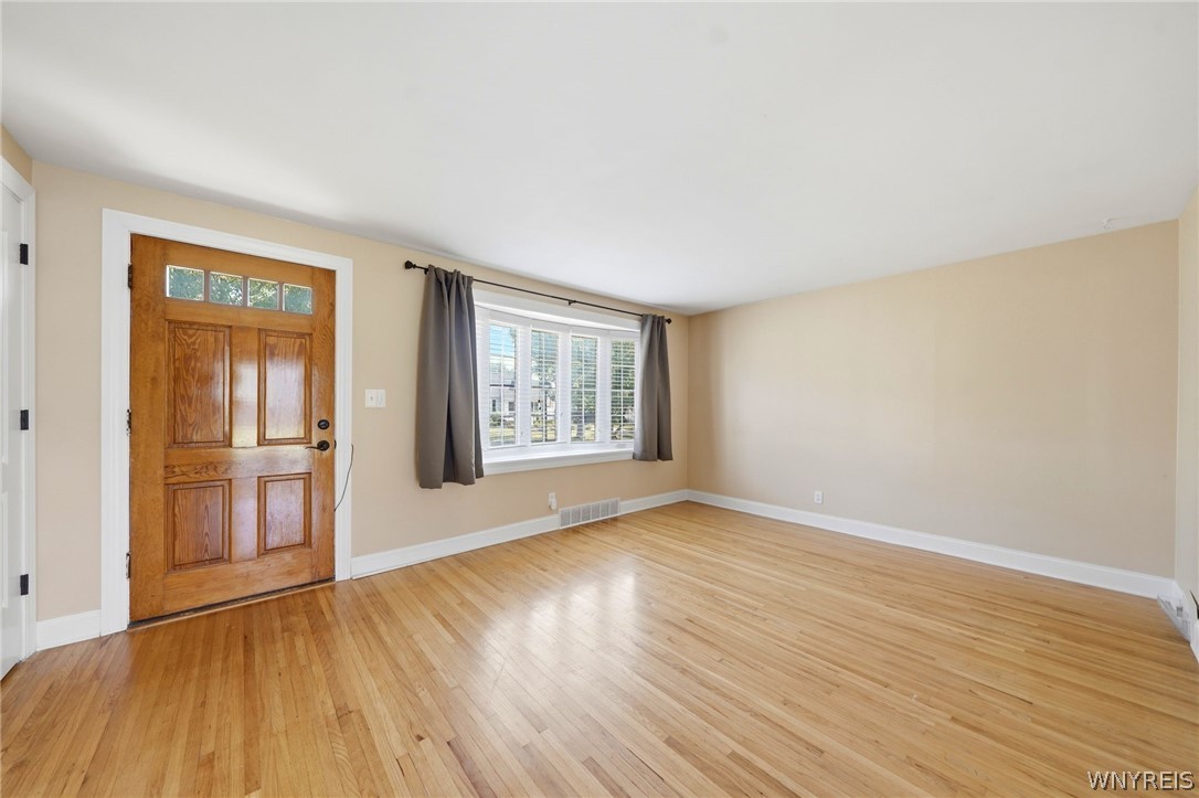 212 Treadwell Road Tonawanda, NY 14150 - Photo 10 of 39 Another view of the living room with hardwood floo