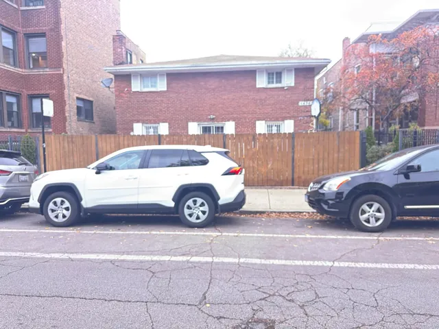 a car parked in front of a building