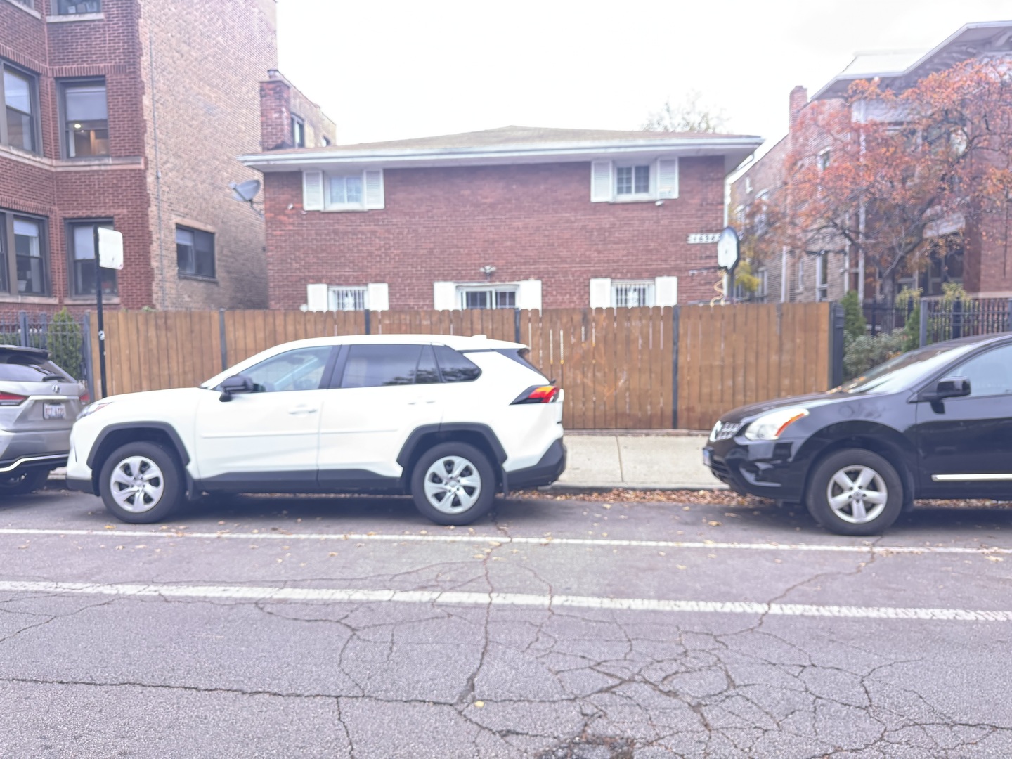1634 West Morse Avenue, Unit C Chicago, IL 60626 - Photo 1 of 27 a car parked in front of a building