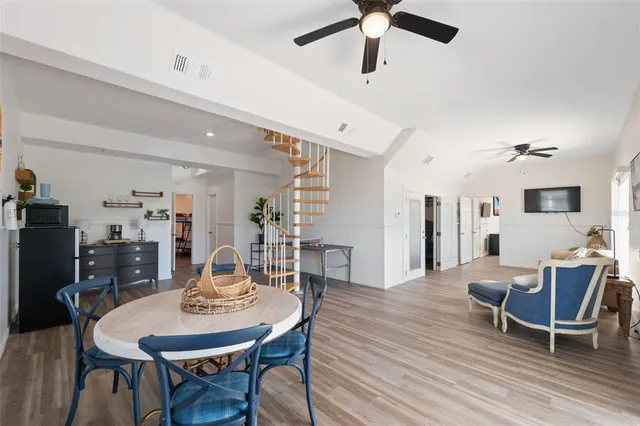 a view of swimming pool with outdoor seating