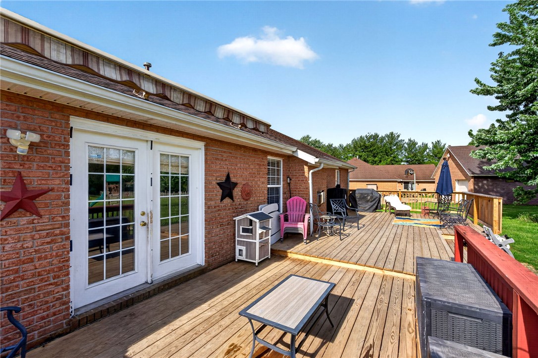 4996 Shannon Avenue Springfield, OH 45504 - Photo 53 of 61 This spacious wooden deck offers an ideal outdoor living space for relaxation and entertaining.