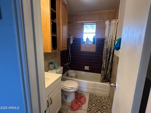 a living room with furniture and a outdoor space