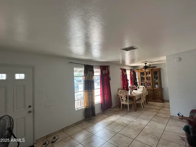 a room with furniture and window