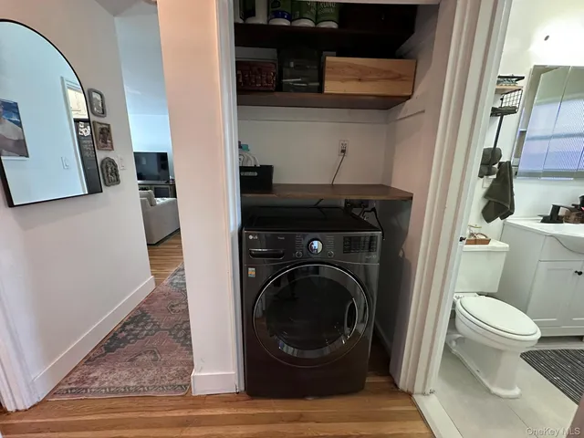 a view of bathroom with a toilet and a sink