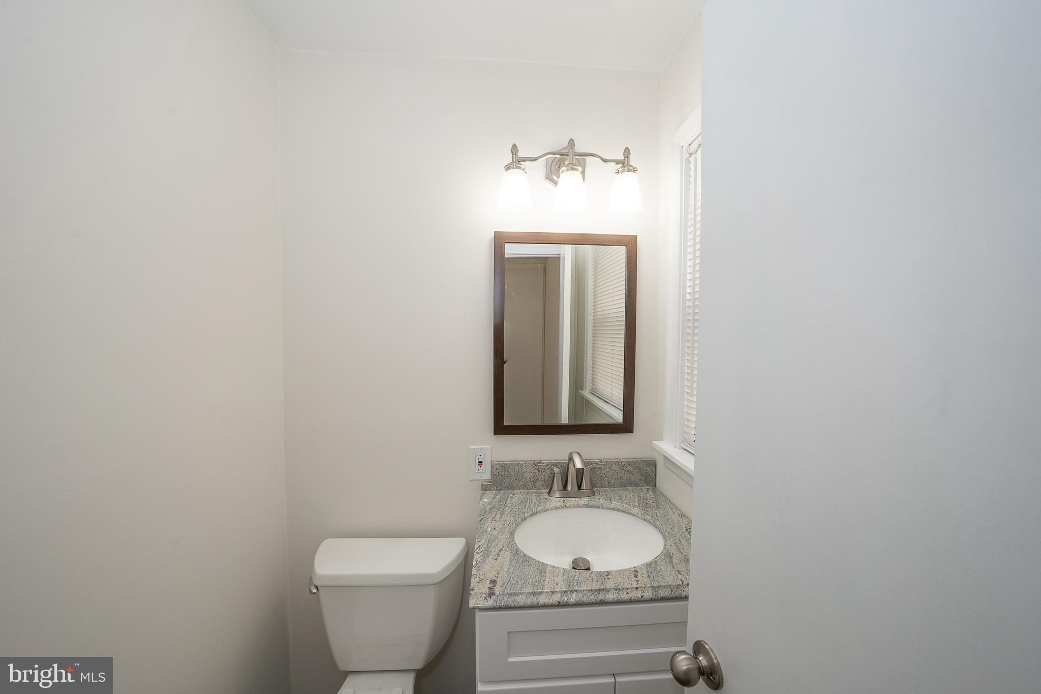8 Applewood Road Malvern, PA 19355 - Photo 30 of 63 Renovated Powder Room w/Granite Vanity