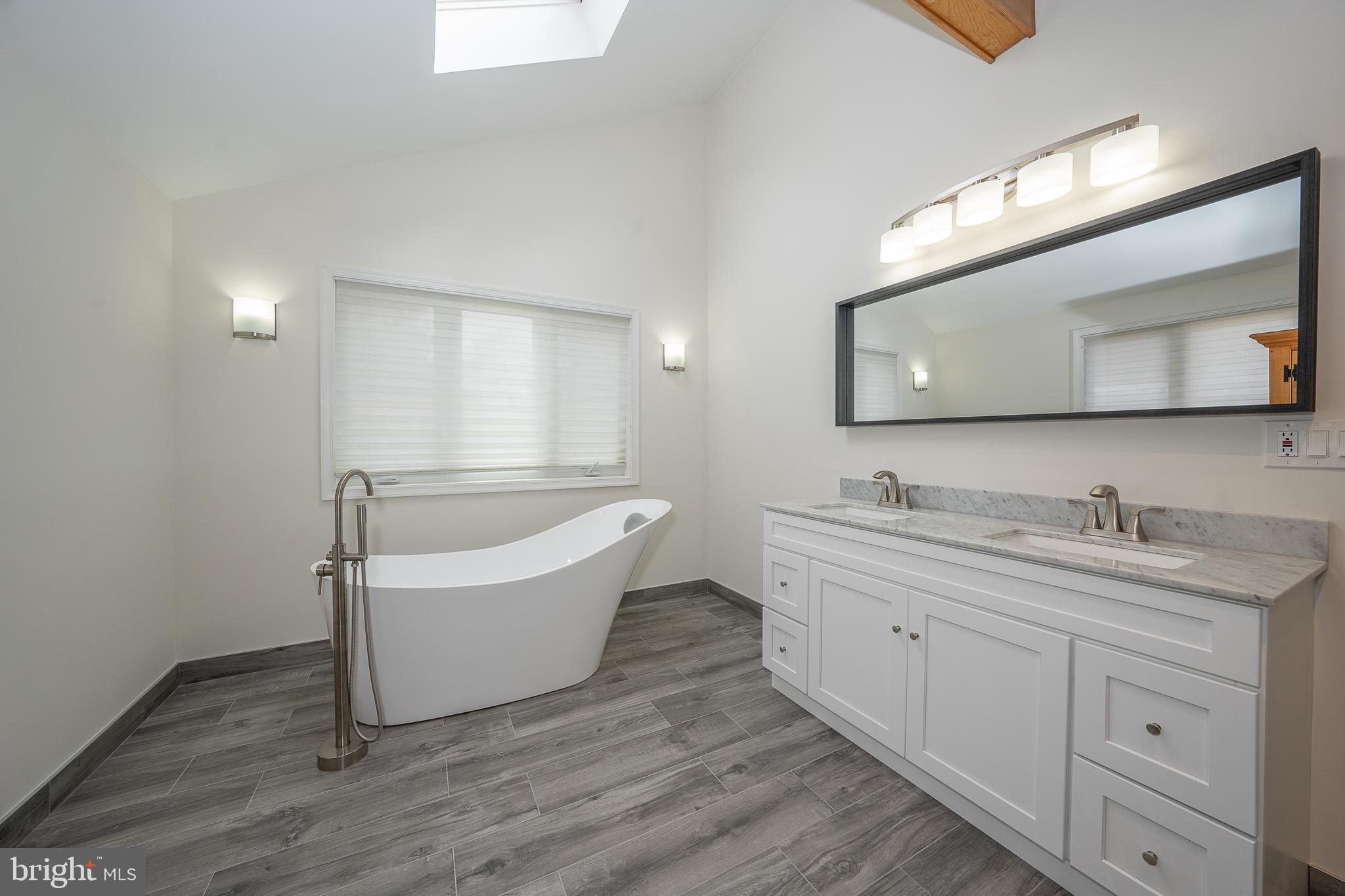 8 Applewood Road Malvern, PA 19355 - Photo 42 of 63 Primary Bathroom w/Porcelain Tile & Soaking Tub