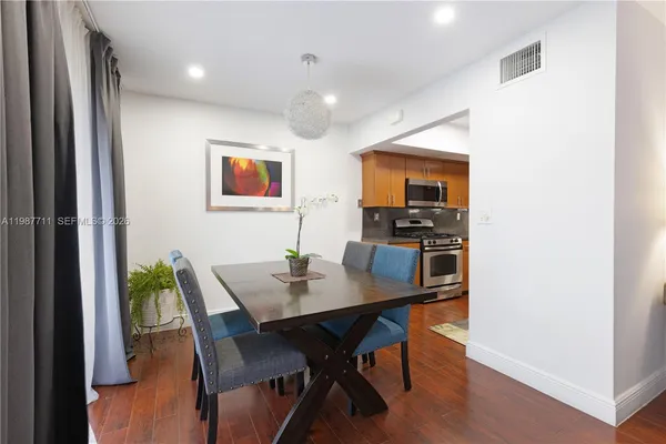 a view of a dining room with furniture