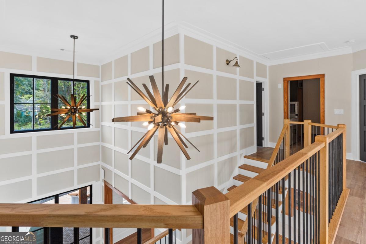 3 Cox Road Roswell, GA 30188 - Photo 14 of 37 a front view of a house with wooden floor