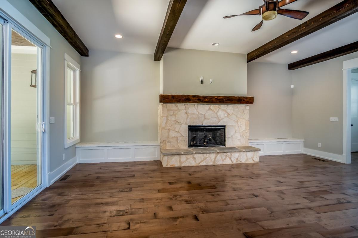 3 Cox Road Roswell, GA 30188 - Photo 18 of 37 a view of an empty room with a fireplace