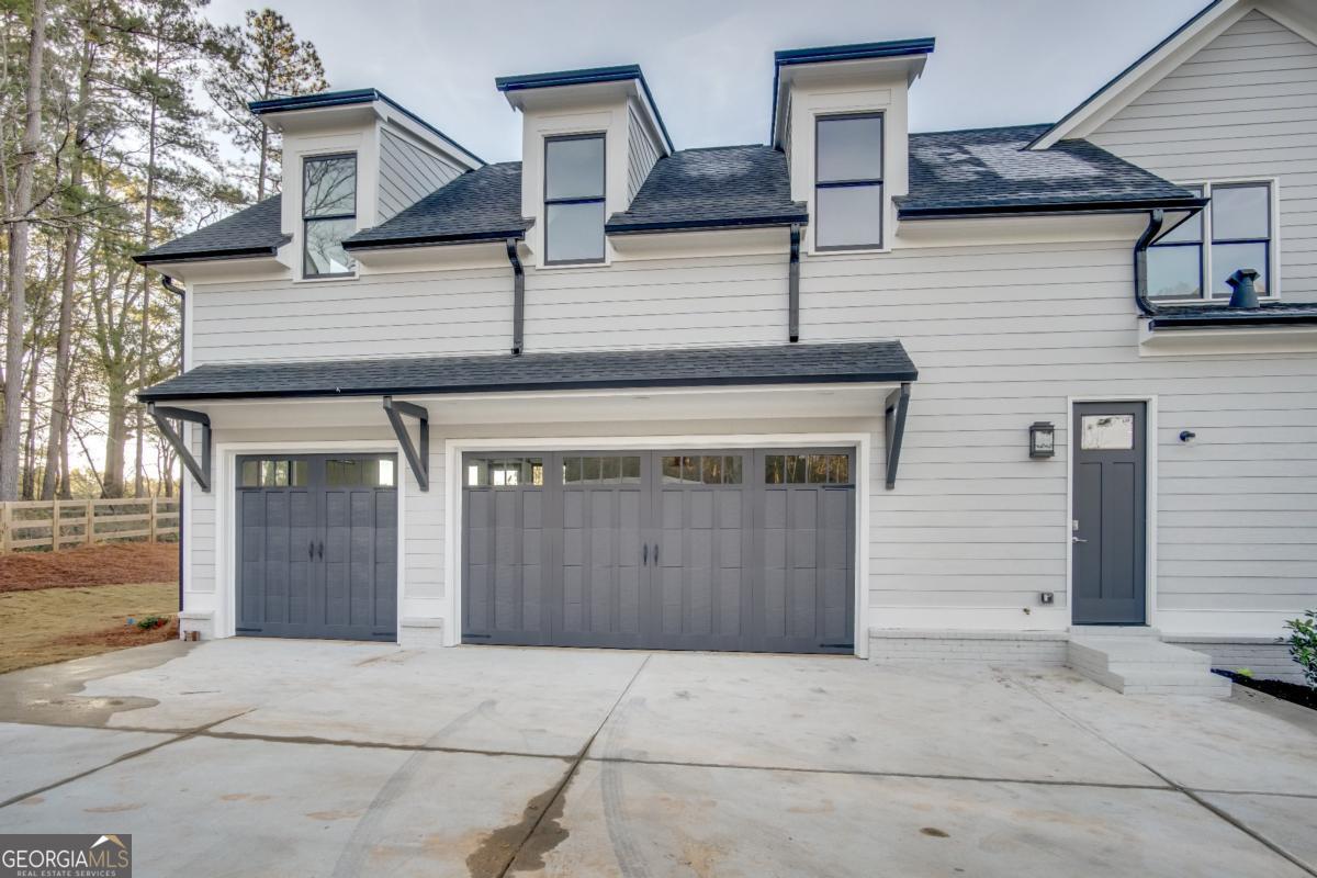 3 Cox Road Roswell, GA 30188 - Photo 8 of 37 a front view of a house with garage