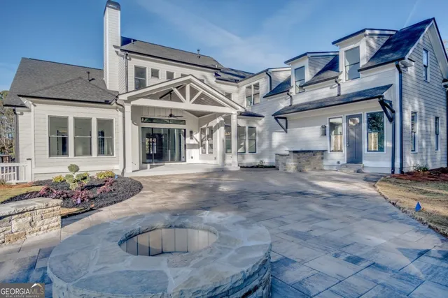 a view of a house with entertaining space