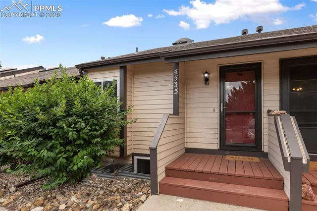 a view of backyard with deck