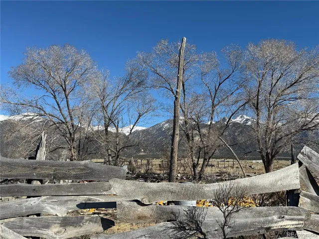 a view of a yard with snow