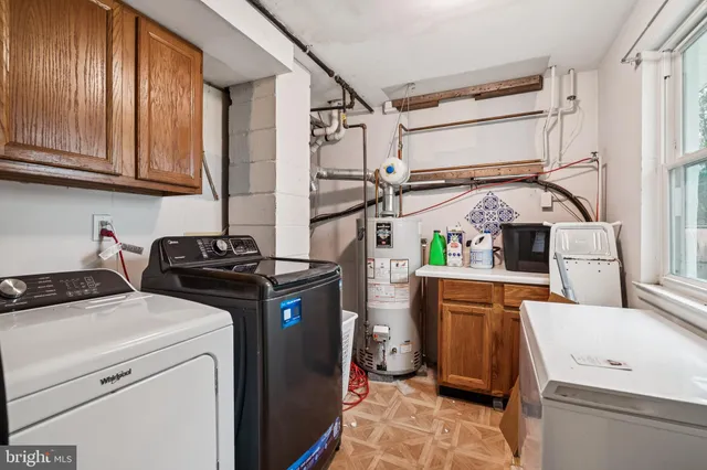 a utility room with dryer and washer