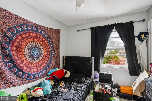 a very nice looking living room with a couch and a flat screen tv