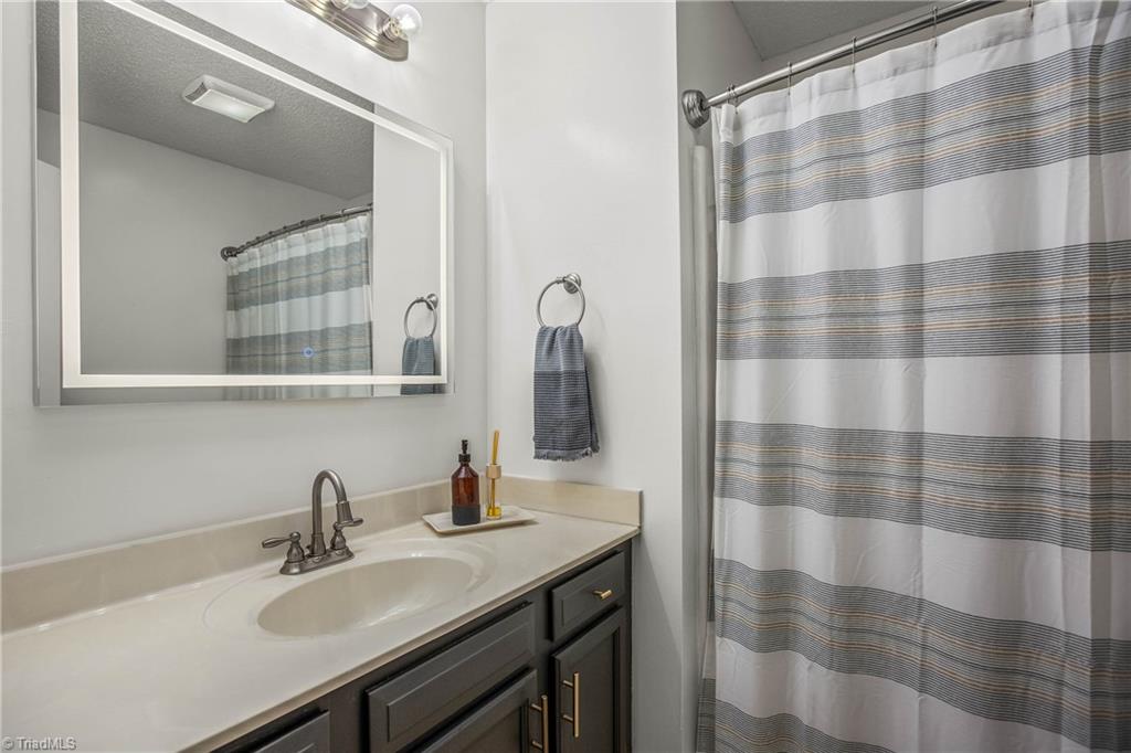 19 Grace Drive Thomasville, NC 27360 - Photo 23 of 33 Primary Bedroom Bathroom