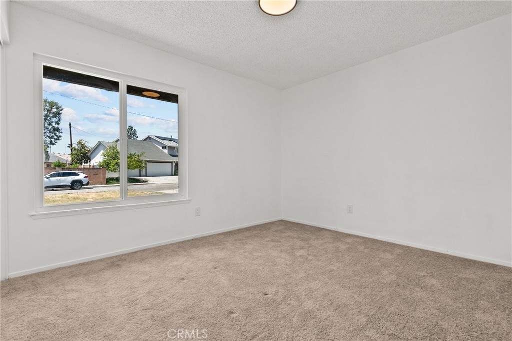 21124 Rosedell Drive Saugus, CA 91350 - Photo 10 of 14 an empty room with a window