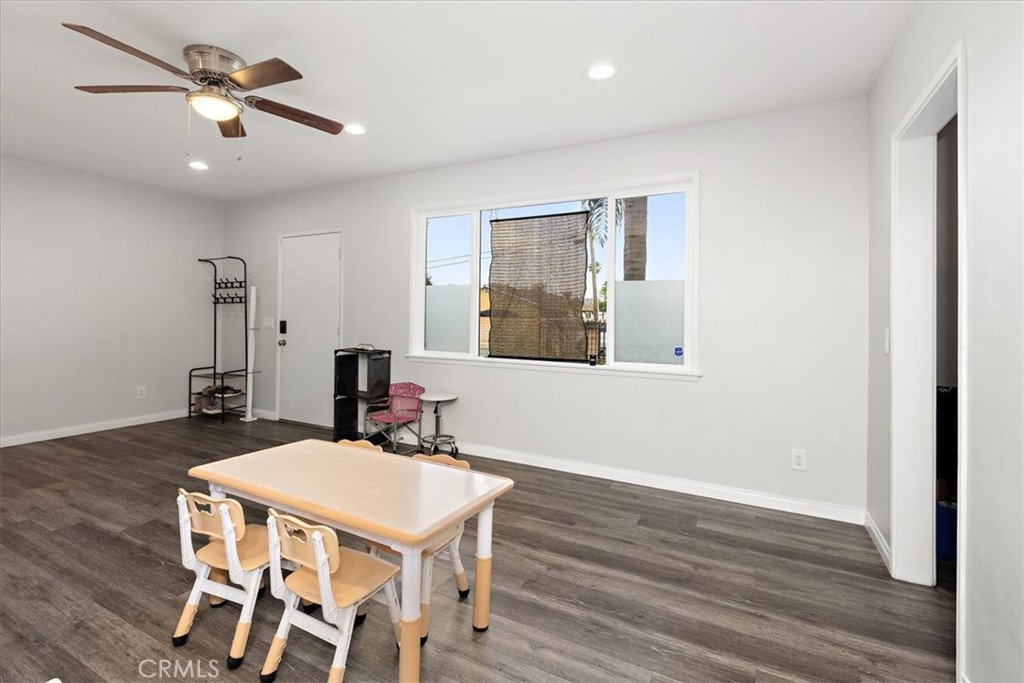 583 West Gray Street Colton, CA 92324 - Photo 6 of 22 a view of a dining room with furniture and wooden floor