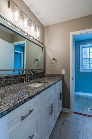 a bathroom with a shower and bathtub