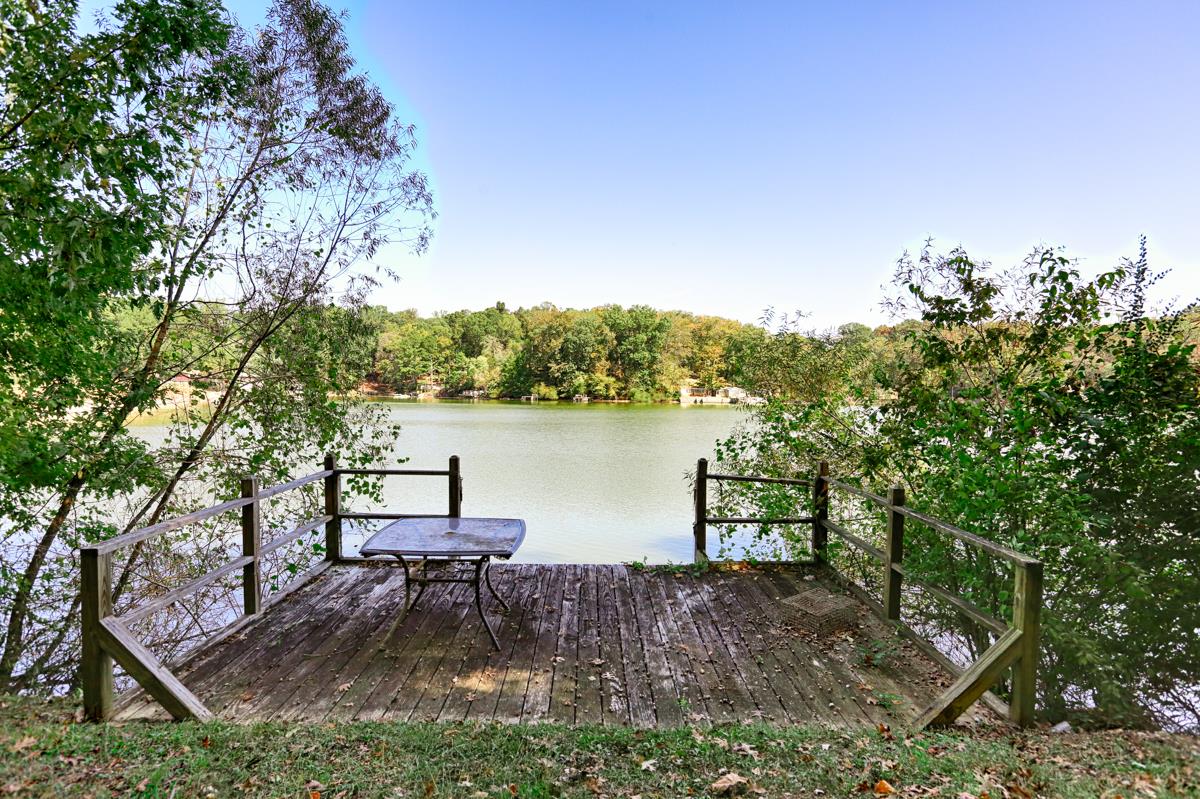 741 Lake Logan Road Ardmore, TN 38449 - Photo 4 of 13 a view of a lake with outside area