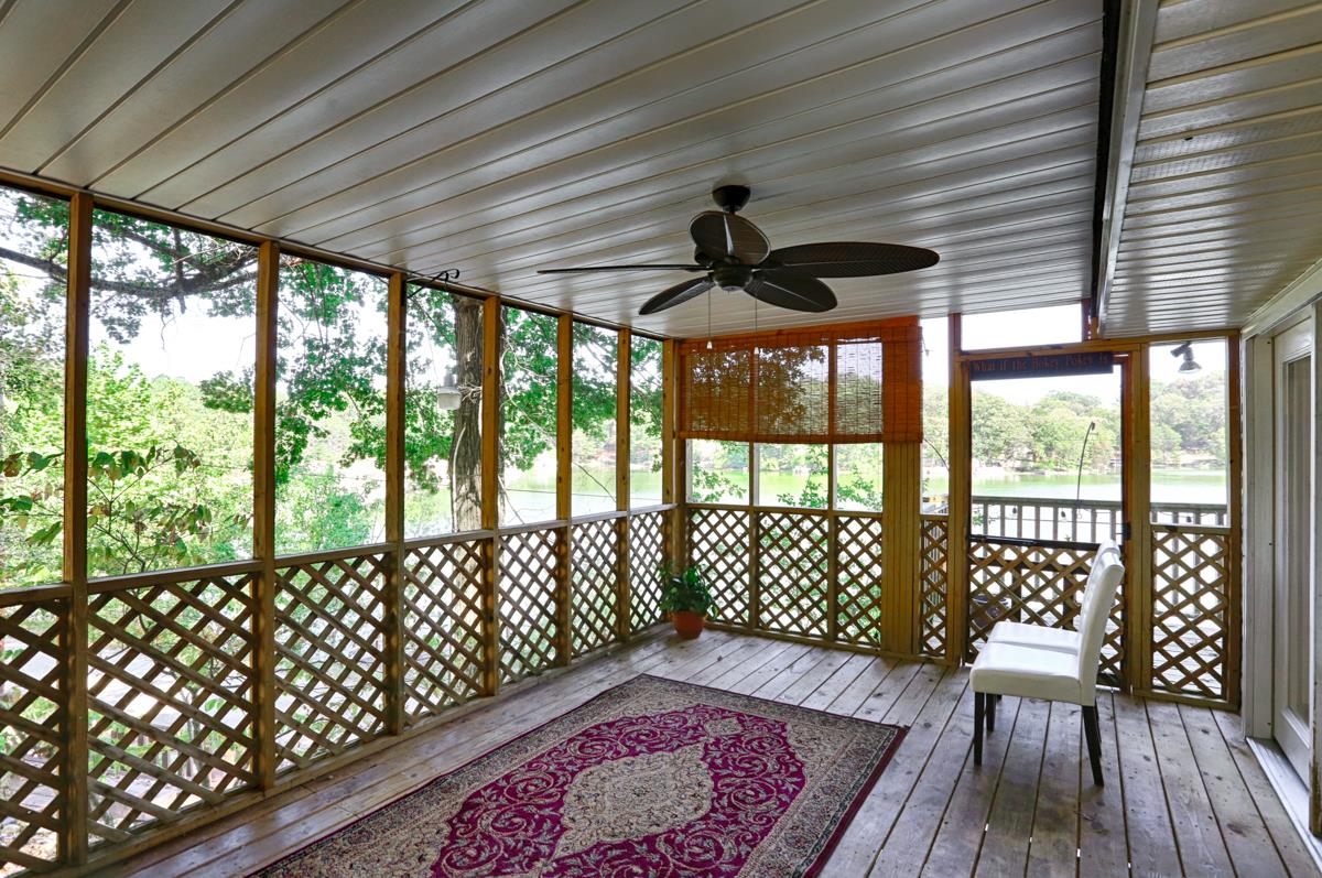 741 Lake Logan Road Ardmore, TN 38449 - Photo 5 of 13 a view of an empty room with a large window