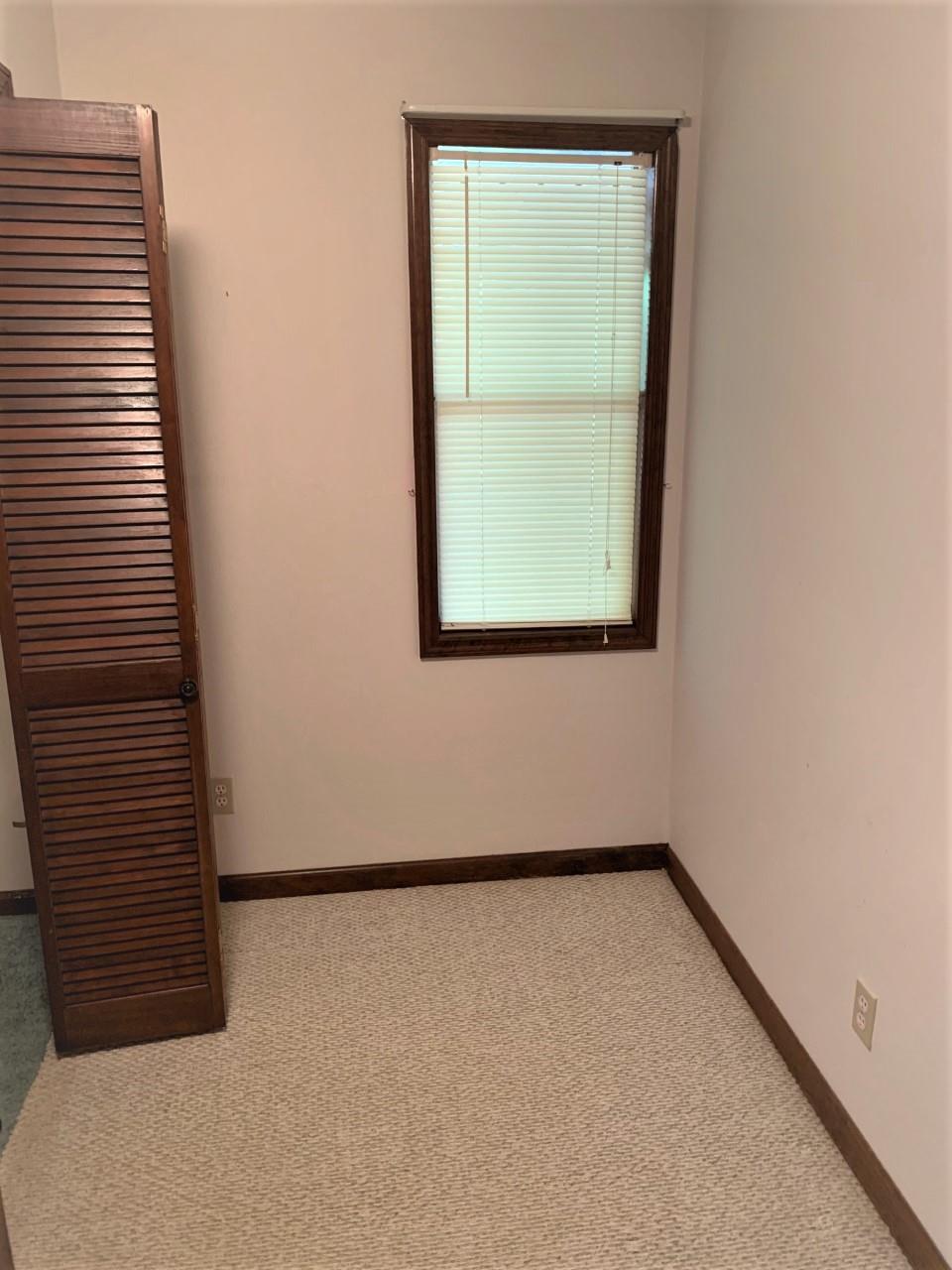 741 Lake Logan Road Ardmore, TN 38449 - Photo 10 of 13 a view of a small space with a window