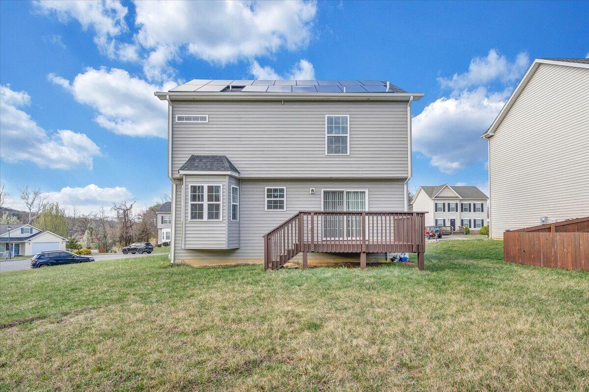 427 Cambridge Ct Road Vinton, VA 24179 - Photo 39 of 46 a view of a house with a yard and sitting area