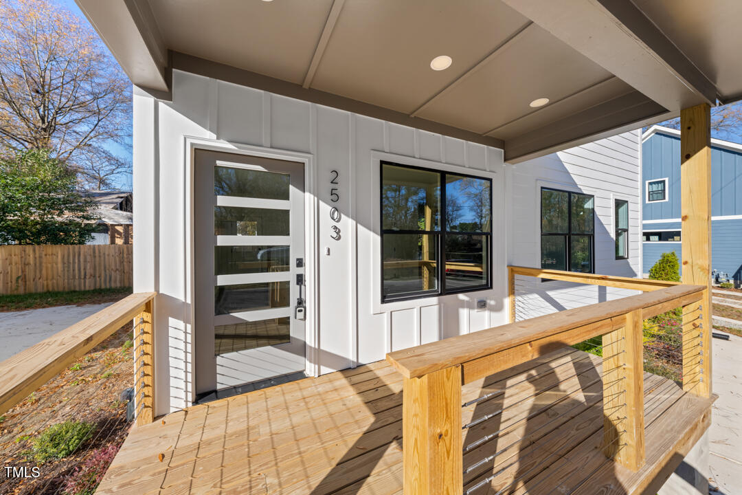 2503 Lednum Street Durham, NC 27704 - Photo 22 of 25 a view of an entryway with wooden floor and door
