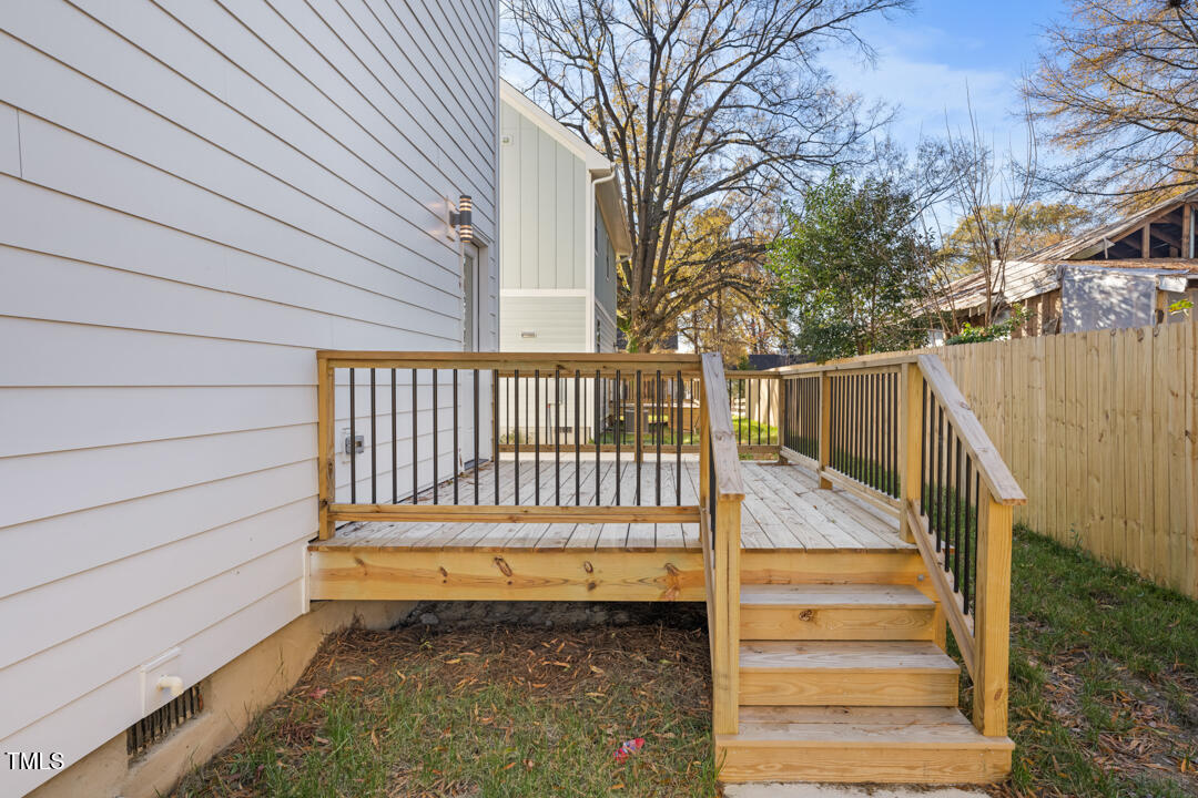 2503 Lednum Street Durham, NC 27704 - Photo 24 of 25 a view of stairs and yard with wooden fence