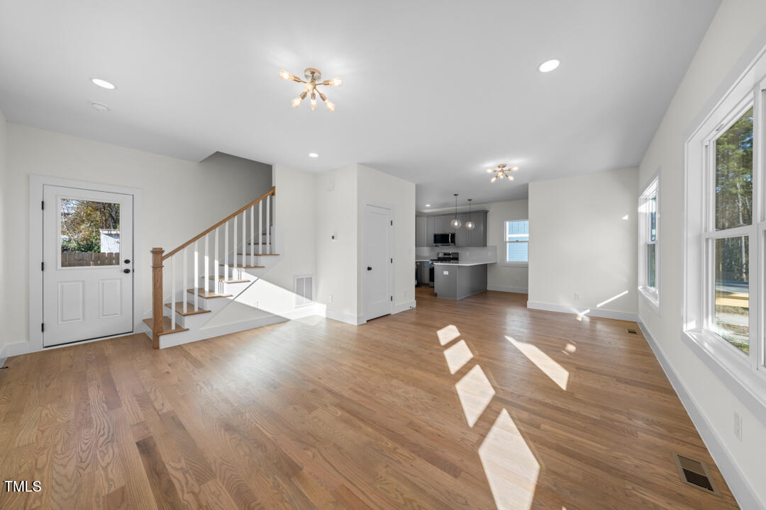 2503 Lednum Street Durham, NC 27704 - Photo 4 of 25 a view of a living room with wooden floor