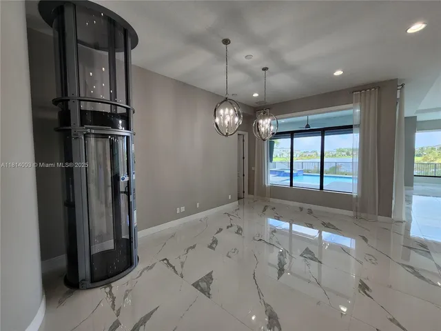 a view of a lake with houses in the back