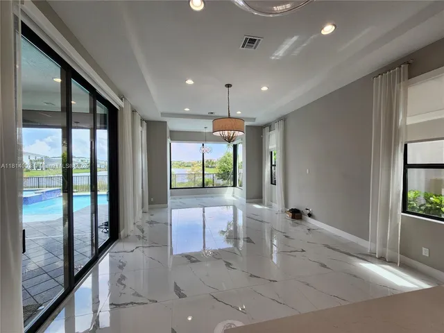 a stove top oven sitting inside of a kitchen
