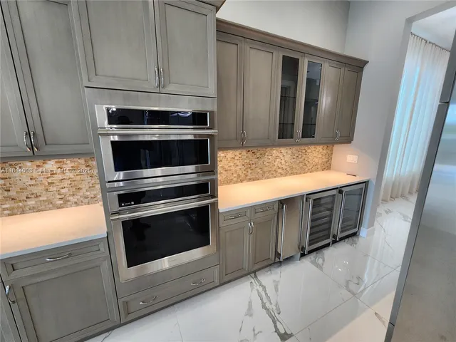 a view of closet area with empty racks