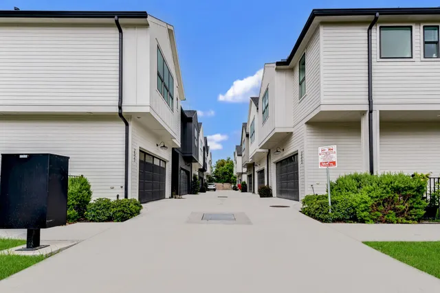 a view of a house with a street